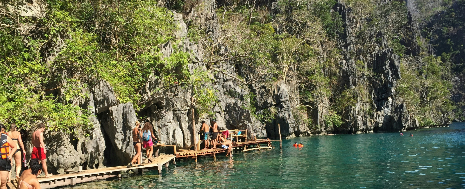 People swimming in Kayangan Lake