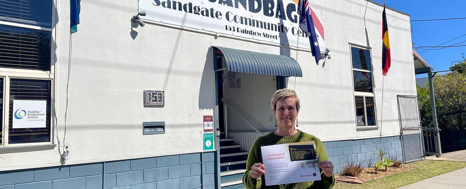 SANDBAG's Erin Williams standing in front of the Sandgate Community Centre